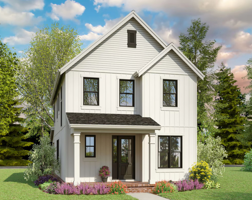 Two-story white house with garden and trees.