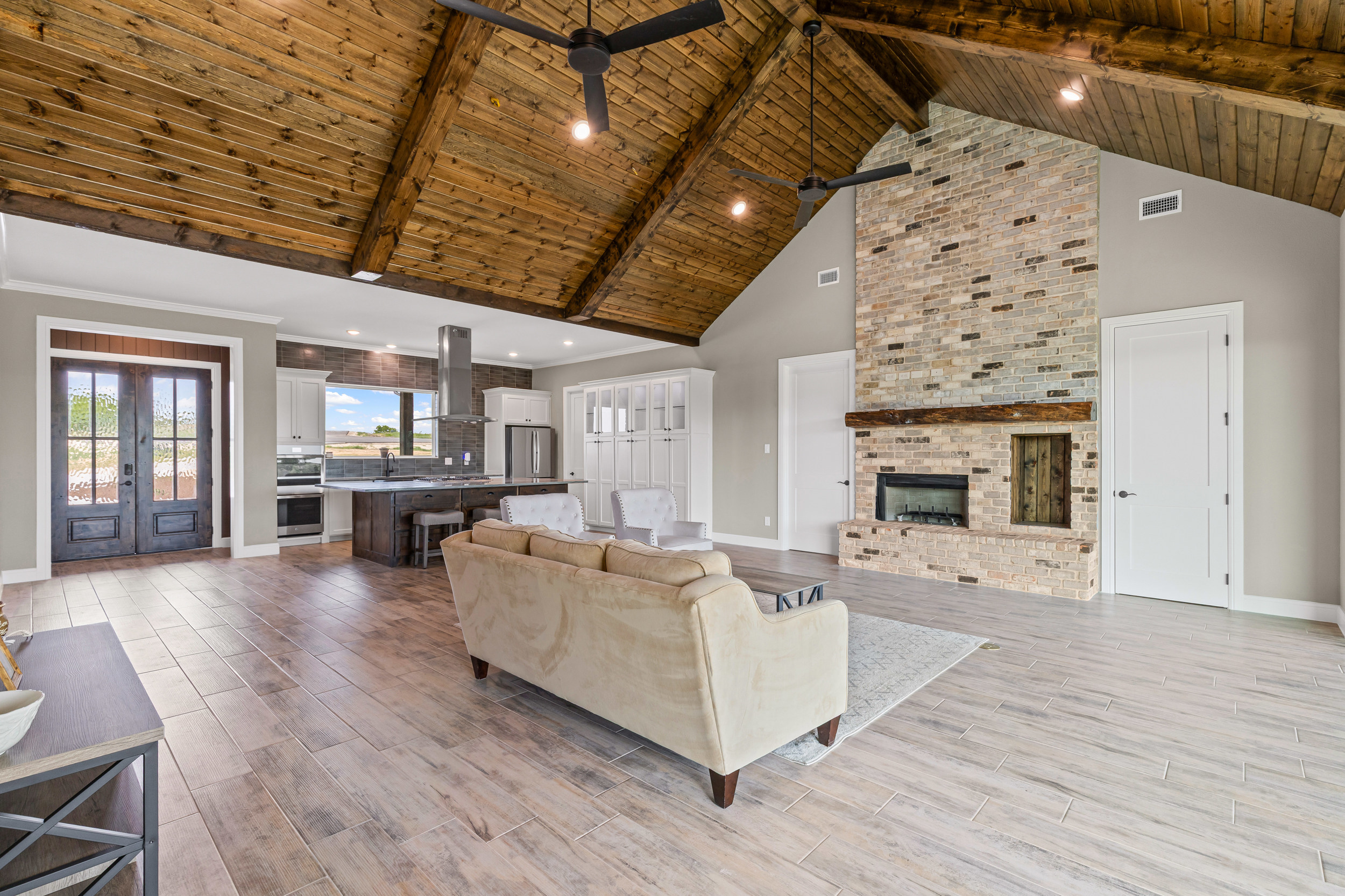 Modern rustic living room with stone fireplace